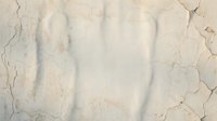 Shadow of human hand cast on cracked weathered wall surface creating dramatic silhouette effect for artistic and design projects.