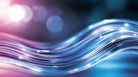 Flowing abstract waves in pink and blue colors with bokeh light effects create dynamic motion background suitable for modern presentations and designs.