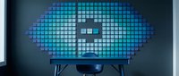 Digital brain icon made of blue pixelated squares displayed on monitor screen, representing artificial intelligence, data processing, and technology innovation for web design and digital solutions.