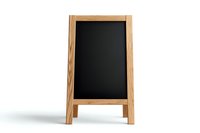 Empty wooden frame chalkboard stand with black surface on white background, isolated menu board for cafe, restaurant or retail display purposes.