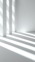 Minimalist white interior with dramatic diagonal sunlight and shadows cast through window blinds creating geometric patterns on clean walls and floor.