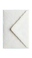 Handmade deckle edge envelope in ivory white with textured recycled paper, isolated on white background for wedding stationery design use.