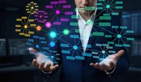 Professional businessman presenting colorful digital network connections and data visualization technology for modern business analytics and connectivity solutions.