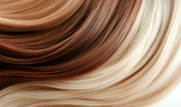 Smooth flowing waves of brown and blonde hair strands creating abstract pattern with soft gradient transitions. For beauty salon, cosmetics or hairstyle designs.