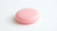 Pink soap bar or bath bomb isolated on white background, ready for product photography, cosmetics packaging design, and beauty retail marketing.