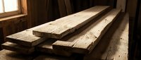 Rustic wooden planks stacked in workshop with natural sunlight streaming through window. Raw lumber boards ready for carpentry and woodworking projects.