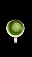 Matcha green tea latte in a white ceramic mug, top view, isolated on transparent background. Ready for cafe menus, stickers, t-shirt design, and print on demand.