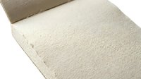 Handmade paper sheets with natural texture and rough edges for crafting and artistic projects on white background.