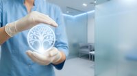 Healthcare professional in blue scrubs holding glowing tree of life symbol, representing wellness, growth, and holistic medicine in modern medical environment.