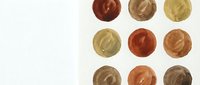 Cosmetic foundation color palette swatches showing diverse skin tone shades from light to deep for makeup matching and beauty product selection.