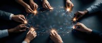 Group of diverse professionals joining hands in circle with glowing network connections, symbolizing teamwork, collaboration, and digital innovation for business solutions.