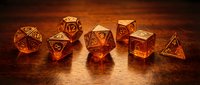 Set of seven polyhedral gaming dice in warm amber translucent material on wooden surface for tabletop role-playing games and board game adventures.
