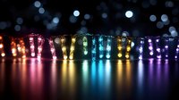 Colorful LED string lights creating rainbow spectrum glow with bokeh background for holiday decoration and festive atmosphere design projects.