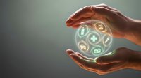 Hands holding a glowing holographic sphere with medical icons, symbolizing healthcare protection, digital medicine, and modern health insurance concepts.