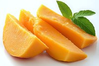 Fresh juicy mango slices with green leaves on white background, bright tropical fruit wedges showing vibrant yellow flesh and smooth texture for food design.