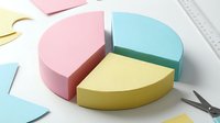 Colorful 3D pie chart with pink, blue and yellow segments on white background for business presentations and data visualization reports.