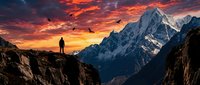 Silhouette of a solo hiker standing on a rocky cliff edge at sunset, gazing at snow-capped mountain peaks. Dramatic orange and red sky with golden light. Perfect for adventure, travel, and motivational content.