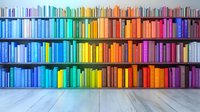 Rainbow colored books arranged on wooden shelves creating spectrum pattern from blue to red. Light gray wooden floor reflects colorful spines. Modern library interior.