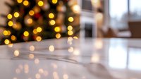 Blurred Christmas tree lights create magical bokeh effect on glossy reflective surface, festive holiday atmosphere in cozy home interior setting.