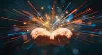 Open hands releasing burst of colorful light rays and sparkles against dark background symbolizing energy, power, creativity and magical transformation.