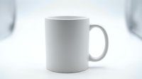 White ceramic mug isolated on white background, ready for custom design, branding, and merchandise mockup applications.