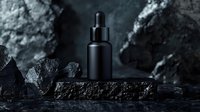 Minimalist black cosmetic dropper bottle on dark stone with dramatic lighting and raw crystals. Luxury skincare product photography for premium branding.