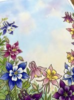 Watercolor columbine flowers border in purple, blue, pink and yellow on soft pastel sky background with copy space for text or greeting cards.