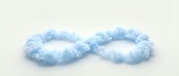 Fluffy white clouds forming infinity symbol on light background representing endless possibilities, eternity, limitless potential and continuous cycle concepts.