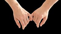 Pair of hands with wedding rings forming heart shape, isolated on transparent background, ready for design use on t-shirts, stickers, print-on-demand products and sublimation projects.