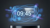Futuristic holographic digital clock display showing time with glowing blue energy rings and light effects on dark background for tech interfaces.