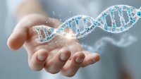 Hand holding glowing DNA strand with digital particles, representing genetic research, biotechnology advancement, and medical innovation in genomics science.