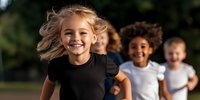 Joyful diverse group of children running outdoors in summer, blonde girl leading with natural smile, motion captured hair, blurred background, lifestyle portrait.