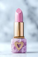 Pink lipstick with gold cap on crystal amethyst base decorated with glitter heart against marble background, luxury cosmetic product photography.