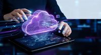 Business professional using tablet with glowing purple cloud computing hologram for digital transformation and data storage solutions.