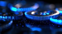 Macro shot of metal gears with blue illumination showing mechanical details and industrial engineering concept, shallow depth of field creates dramatic lighting effect.