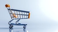 Empty shopping cart on light background with soft shadow, minimalist composition representing retail, commerce, and consumer behavior in modern marketplace.