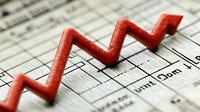 Red zigzag line on financial chart background showing market volatility and price movement analysis, macro view of stock market data visualization.