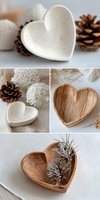 Rustic wooden heart-shaped bowls with natural decorative elements like pine cones and dried plants for home decor or wedding accessories.