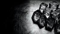 Young man with light skin tone, professional appearance, positioned among scattered ice cubes on dark textured surface, suitable for beverage, refreshment, cooling, and summer drink marketing materials.