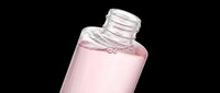 Open glass bottle with pink liquid inside, isolated on transparent background. Ready for cosmetics, skincare, perfume, and beauty product designs. Perfect for t-shirt designs, clipart, stickers, and print-on-demand projects.