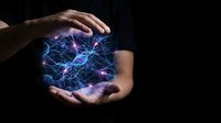 Hands protecting glowing blue neural network brain with electric connections on dark background for AI technology and innovation concepts.