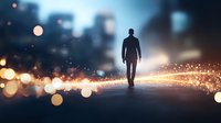 Silhouette of man walking on illuminated path with magical light sparkles and bokeh effects against urban nighttime cityscape background.