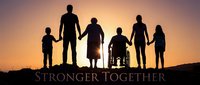 Silhouettes of diverse family members holding hands against golden sunset sky, including child in wheelchair, representing unity, support and togetherness for community campaigns.