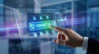 Businessman touching contact us button on transparent digital interface with communication icons and data visualization in modern office environment.