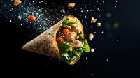 Levitating shawarma wrap with flying ingredients and spices on dark background. Fresh vegetables and grilled meat create dynamic food composition.
