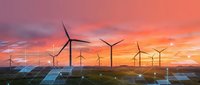 Wind turbines and solar panels generating renewable energy at sunset with dramatic orange and pink sky creating sustainable power landscape.