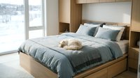 Modern bedroom with golden retriever resting on gray bedding, wooden bed frame, built-in shelving, and snowy winter landscape visible through large windows for home decor and lifestyle content.