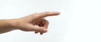 Human hand pointing finger gesture isolated on white background for design and presentation use.