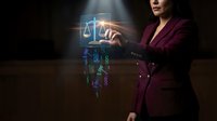 Professional woman in burgundy suit interacting with holographic justice scales and digital data interface in dark corporate environment for legal technology.
