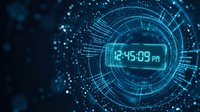 Futuristic digital clock displaying time with glowing blue holographic interface and geometric patterns on dark technology background for sci-fi designs.